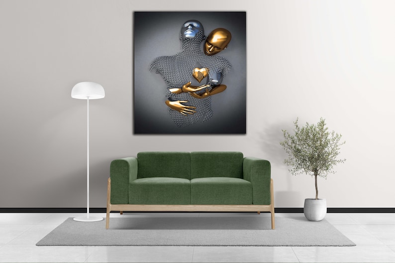 May include: Abstract art print featuring a silver and gold sculpture of two figures embracing. The figures are made of wire mesh and have a heart shape in the center of their chest.
