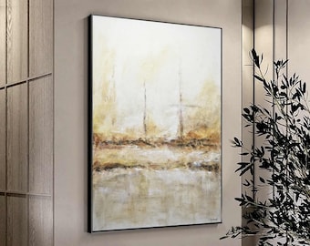 May include: Abstract painting with a white background and brown and beige brushstrokes. The painting has a horizontal line in the middle, with a lighter area above and a darker area below. The painting is framed in black.