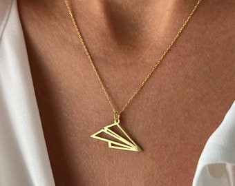 Ketting van goudkleurig papiervliegtuig: sterlingzilveren reishanger