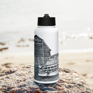 Cadillac Ranch Part Deux Stainless steel water bottle with a straw lid
