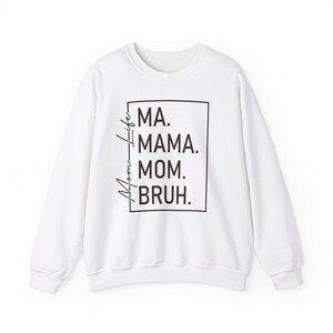 May include: White sweatshirt with black text that reads "Ma. Mama. Mom. Bruh." in a box.