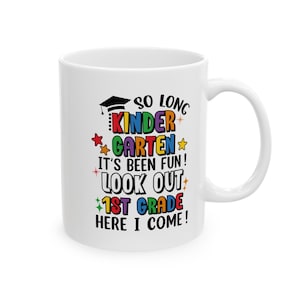 May include: White ceramic coffee mug with a colorful design that says "So long Kindergarten, it's been fun! Look out 1st grade, here I come!"