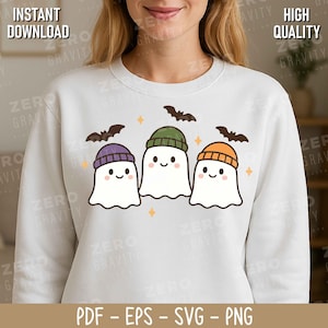 May include: White sweatshirt featuring a graphic of three cartoon ghosts wearing beanies in purple, green, and orange. Bats and stars are also included in the design. The words "INSTANT DOWNLOAD" and "HIGH QUALITY" are printed on the top of the image.