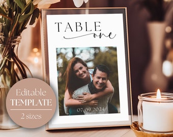 May include: White table number sign with black text that reads "TABLE one" and a photo of a couple. The date "07.09.2024" is printed below the photo.