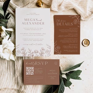 Peut inclure: Une suite d'invitation de mariage dans les tons bruns et blancs. L'invitation présente un motif floral avec les noms Megan et Alexander. La carte RSVP comprend un code QR et un espace pour saisir votre nom et votre choix de RSVP.