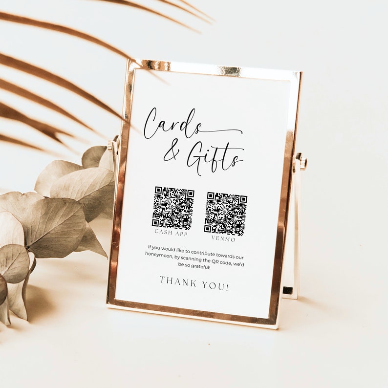 K&ouml;nnte beinhalten: Ein wei&szlig;es Schild mit schwarzem Text und zwei QR-Codes. Der Text lautet "Cards & Gifts", "Cash App", "Venmo", "Wenn Sie zu unseren Flitterwochen beitragen m&ouml;chten, scannen Sie den QR-Code. Wir w&auml;ren Ihnen sehr dankbar!" und "Vielen Dank!"