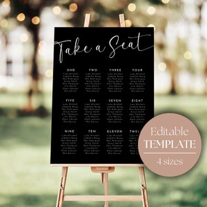 May include: Black and white wedding seating chart sign with the text "Take a Seat" at the top. The sign is divided into twelve sections, each with a number and a list of names. The sign is on an easel.