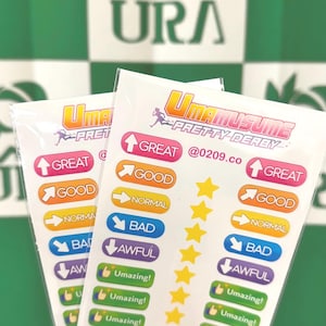 May include: Two sticker sheets with colorful labels and text. The stickers feature the words "GREAT", "GOOD", "NORMAL", "BAD", and "AWFUL", along with star and thumbs-up icons. The text "UMAMUSUME PRETTY DERBY" is also visible.