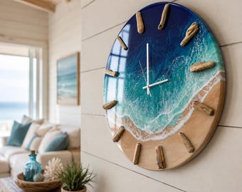 May include: A circular wall clock featuring a glossy resin finish that mimics an ocean shoreline. The design transitions from deep blue at the top to turquoise waves and a sandy beige base. Twelve pieces of driftwood serve as hour markers.