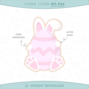 Può includere: Un tagliabiscotti a forma di uovo di Pasqua rosa e bianco con orecchie e zampe di coniglio. Il design include il testo "COOKIE CUTTER STL FILE", "ICING INSPIRATION", "CUTTER SHAPE" e "INSTANT DOWNLOAD".