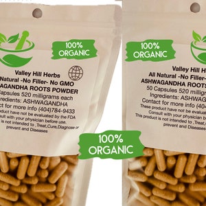 Peut inclure: Deux sacs en papier brun avec des &eacute;tiquettes blanches contenant 50 capsules de poudre de racines d'Ashwagandha. Les &eacute;tiquettes indiquent "100% Bio" et "Naturel - Sans Additif - Sans OGM".