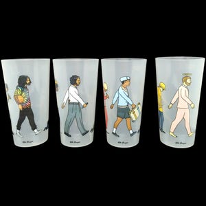 May include: Set of four clear plastic cups with colorful illustrations of people walking. Each cup features a different person with unique clothing and accessories.