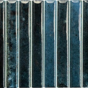 May include: A series of fourteen vertical rectangular ceramic tiles arranged side by side. Each tile features a glossy, deep blue glaze with mottled dark navy and teal variations, creating a textured appearance with reflective highlights.