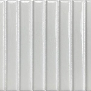 May include: A rectangular ceramic wall tile in a glossy white finish, featuring a series of vertical, raised, rounded ridges that run parallel across the entire surface, creating a consistent, textured, and linear pattern.