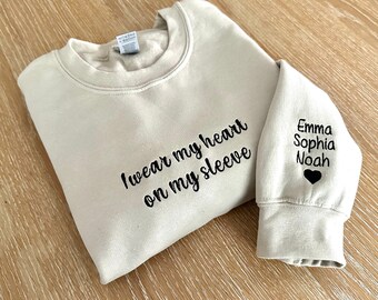 I wear My Hert On My Sleeve Embroidered Sweatshirt, Gift for Mom, Custom Mama Sweatshirt with Children Name on Sleeve, Mothers Day