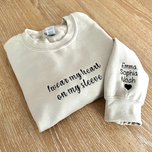 I Wear My Heart On My Sleeve Sweatshirt, Embroidered Custom Mama Shirt With Kids Names, Gift for Mom, Gift for New Mom,