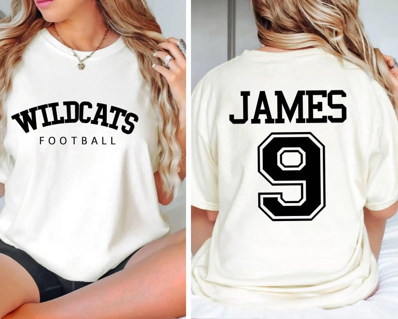 May include: White t-shirt with black text that says "Wildcats Football" on the front and "JAMES 9" on the back.