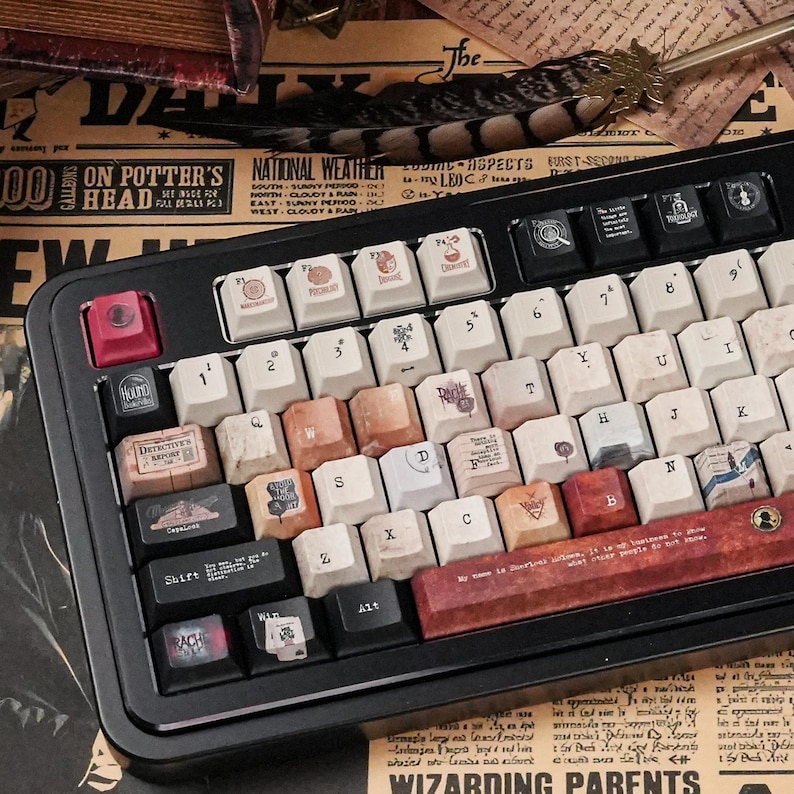 May include: A black mechanical keyboard with custom keycaps. The keycaps feature various designs and text, including the words "Detectives Report" and "Wizarding Parents". The keyboard has a red escape key.