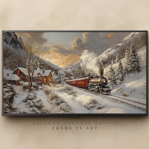 May include: A framed digital art print of a winter landscape featuring a red train traveling through a snowy valley. The artwork depicts a vintage train with smoke billowing from its engine, passing by snow-covered houses and trees. The text "ARIZONA VINTAGE PRINTS FRAME TV ART" is at the bottom.