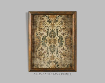 May include: A framed print of a vintage rug with a floral pattern in shades of green, brown, and cream. The frame is a dark brown wood with a distressed finish. The print is titled "Arizona Vintage Prints".