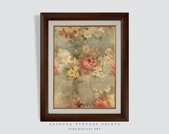 May include: A framed print of a vintage floral pattern with pink, yellow, and white flowers on a blue background. The frame is brown wood with a gold inner edge.