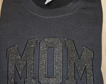 Camiseta o sudadera de mamá con brillantina negra sobre negra