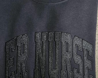 Camiseta o sudadera negra sobre negra de ENFERMERA DE ER