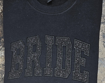 Camiseta o sudadera de NOVIA negra sobre negra