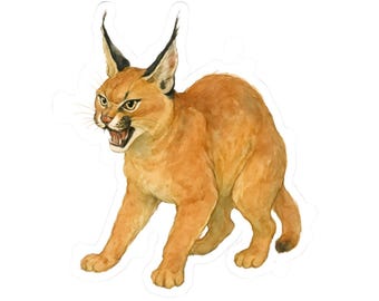 May include: A watercolor sticker of a caracal cat in a defensive stance. The cat has tan fur, black-tipped ears, and an open mouth showing its teeth. The sticker is cut around the cat's outline.