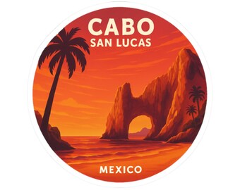 Pode incluir: Adesivo redondo com uma cena de pôr do sol em Cabo San Lucas, México. O design inclui uma palmeira, formações rochosas e o texto "CABO SAN LUCAS" e "MEXICO" em branco. O fundo é um gradiente de laranja e vermelho.