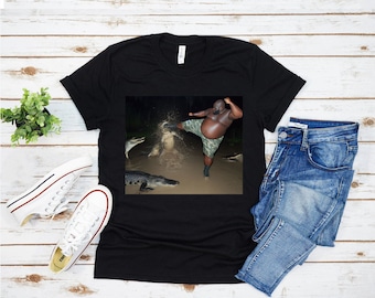 Man Kicking Alligator In Swamp Shirt Tee, Gator, Crocodile, Meme Apparel Viral Tee, Funny Tee Shirt, Joke Gift Shirt