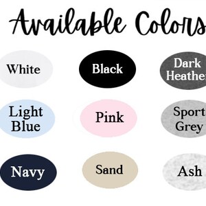 May include: Available colors for a product: white, black, dark heather, light blue, pink, sport grey, navy, sand, and ash.