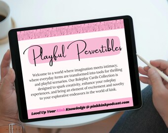 May include: A tablet displays the text "Playful Pervertibles" in a cursive font over a pink background. The text below describes a roleplay card collection designed to spark creativity and enhance experiences. The website address is included.