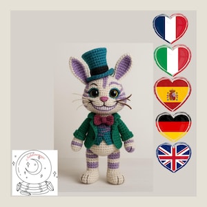 May include: A crocheted Cheshire Cat doll, wearing a teal top hat, green jacket, and a purple bow tie. The doll has a wide grin and striped legs. The image includes a logo and heart-shaped flags.