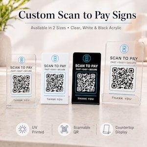 May include: Four acrylic "Scan to Pay" signs in clear, white, and black. Each sign has a QR code and the text "Scan to Pay, Fast, Easy, Secure" and "Thank You". The signs are available in two sizes and are UV printed.