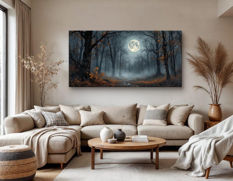 May include: A canvas print of a foggy forest scene with a full moon in the sky. The trees are bare and the ground is covered in fallen leaves.