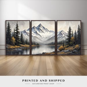 May include: Triptych of framed landscape art featuring mountain scenes with snow-capped peaks, a serene lake, and evergreen trees. The artwork has a muted color palette with brown frames. The text "PRINTED AND SHIPPED" is at the bottom.