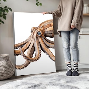 May include: A rectangular canvas print featuring a detailed illustration of an octopus constructed from segmented light brown wooden planks. The octopus has a prominent blue eye and textured suckers along its curved, sprawling tentacles.