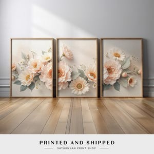 Soft Peach Floral Wall Art Set of 3 | Romantic Blush Flower Canvas Prints with White Daisies and Green Leaves for Elegant Bedroom Decor