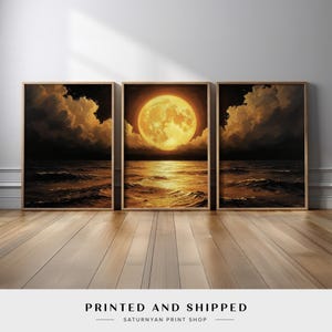 May include: Triptych of framed art prints depicting a moonlit ocean scene. The central print features a large, glowing full moon above the water. The other two prints show dark clouds and waves. The text "PRINTED AND SHIPPED" is at the bottom.