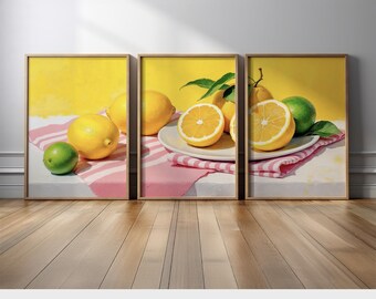 May include: A set of three framed prints featuring a still life of lemons and limes on a pink and white striped tablecloth. The lemons are yellow and the limes are green. The background is a bright yellow.