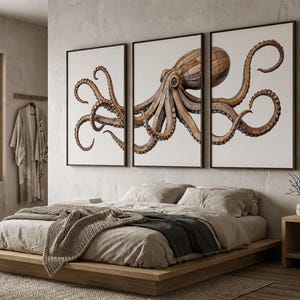 May include: A triptych wall art set featuring a large octopus illustration composed of brown wooden planks. The octopus spans across three separate rectangular white canvases, each framed in a thin dark border, displaying detailed tentacles.