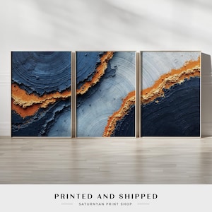 May include: Three abstract art prints with a blue and gold color scheme. The prints feature a textured, layered design with a swirling pattern.