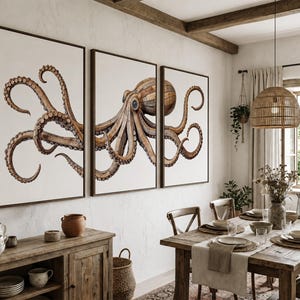 May include: A triptych wall art set featuring a large brown octopus illustration divided across three separate rectangular canvases with dark brown frames, displayed against a light-colored wall in a dining room setting.