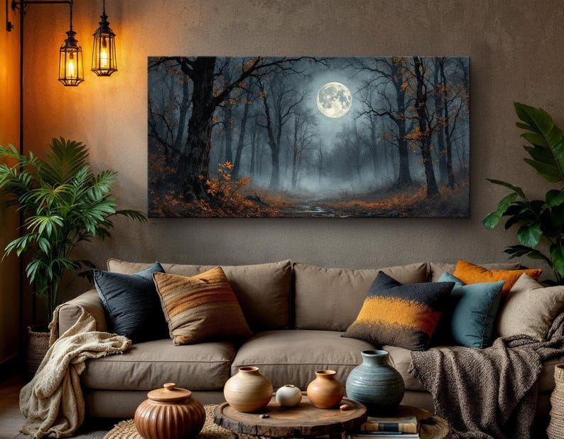May include: A canvas print of a misty forest scene with a full moon hanging in the sky. The trees are silhouetted against the moon and the fog creates a sense of mystery.