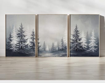 May include: A triptych of framed art prints depicting a misty forest scene in shades of gray and white. The artwork features tall evergreen trees and a soft, atmospheric background. The text "PRINTED AND SHIPPED" is at the bottom.