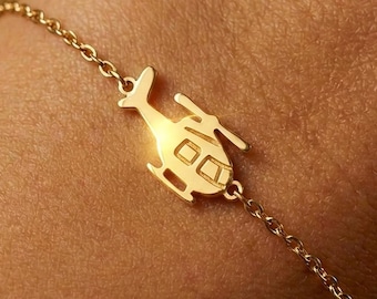 Zartes Hubschrauber-Armband aus 24-karätigem Gold.