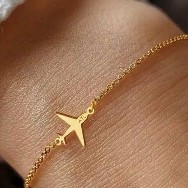 Pulsera de avión chapada en oro de 24 quilates