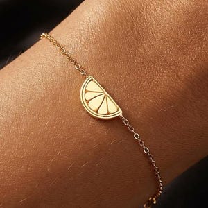 Armband aus 24-karätigem Gold in Form einer Zitronenscheibe