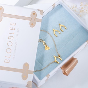 a box that has a necklace in it